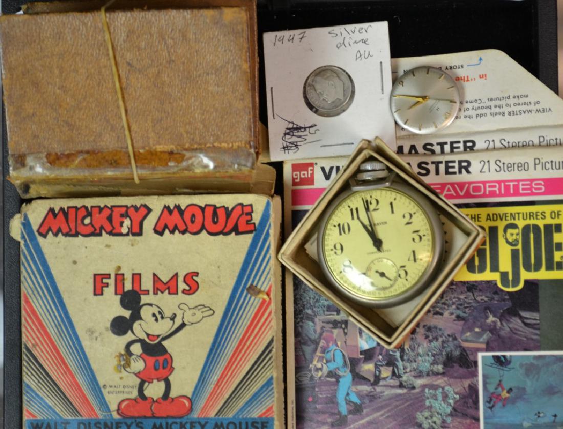 Eclectic Cartoon Collectibles and Watches: Mickey Mouse 8mm film in box, GI Joe and Batman View Master Disks, a New Haven Pocket Watch, Hamilton Watch Movement, a 1947 silver dime and more