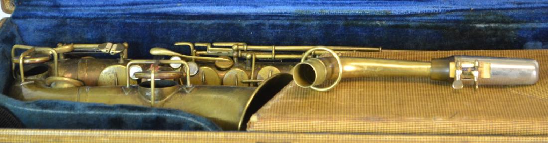 Vintage Elkhart Tru-tone Saxophone in case: low pitch 173/58; 23" with out neck or mouth piece; bell box is empty