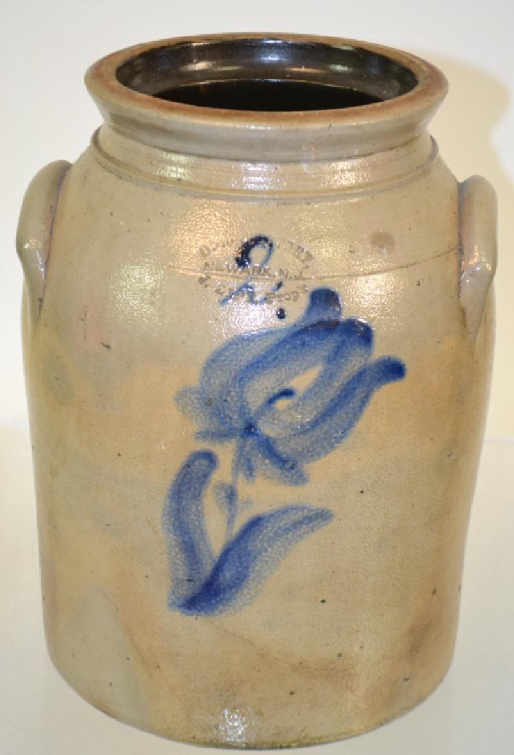 Blue Decorated Stoneware Crock with Tulip: Impressed J. Zipp Prop. Newark NJ. Crock has 2 handles and a well executed tulip on face, tight hairline cracks over body.