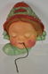 Figural String Dispenser Depicts a little girl's face