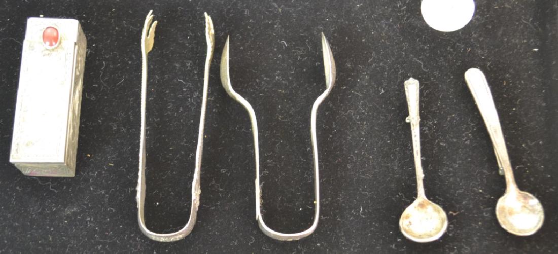 Sterling Grouping: Including a sterling lipstick case, 2 sugar tongs and 2 salt spoon pins