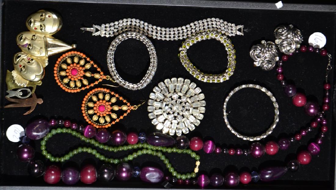 Costume Jewelry Grouping: Including large rhinestone brooch, rhinestone bracelets, beaded necklaces and earrings and more.