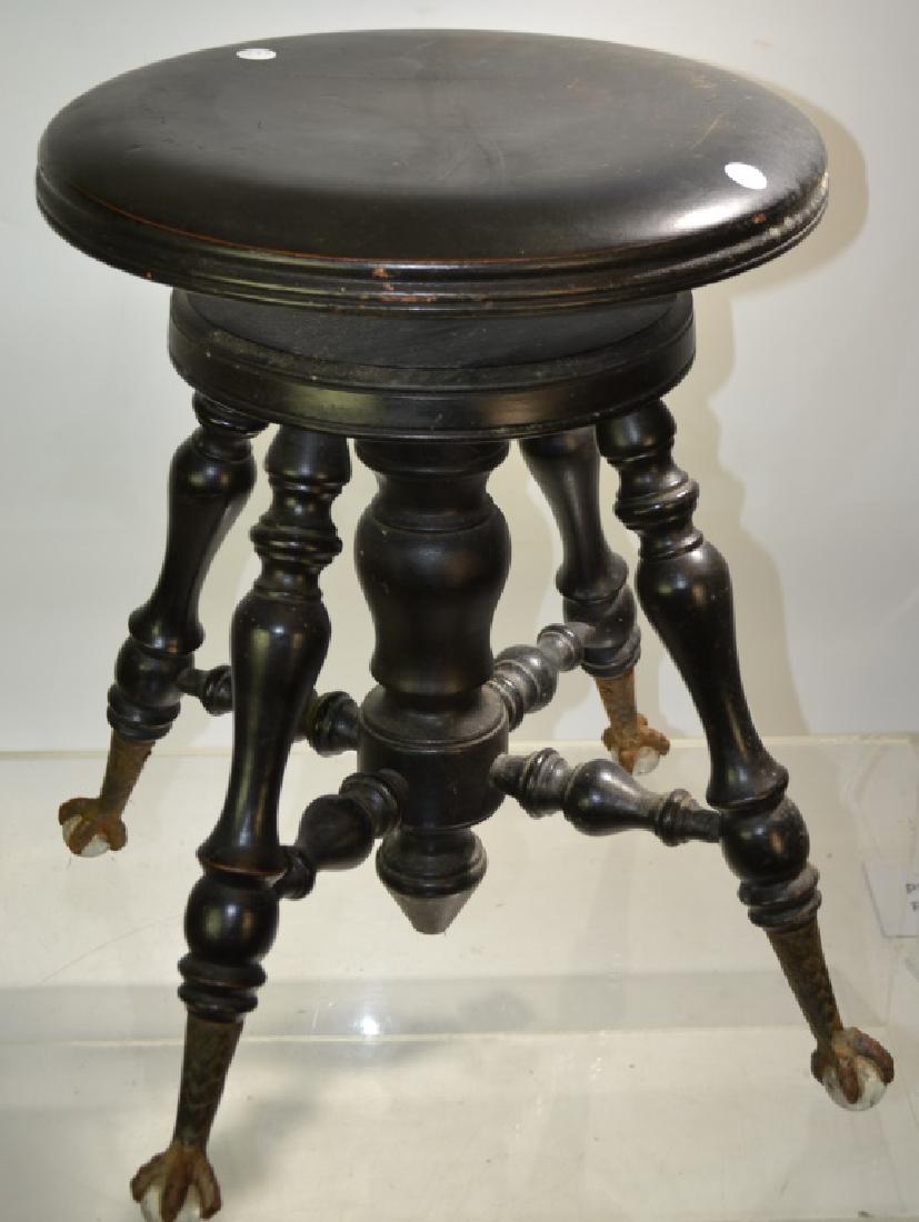 Victorian Piano Stool: Mahogany with ball and claw feet. Some rust and wear to feet consistent with age. Paint wear consistent with age.