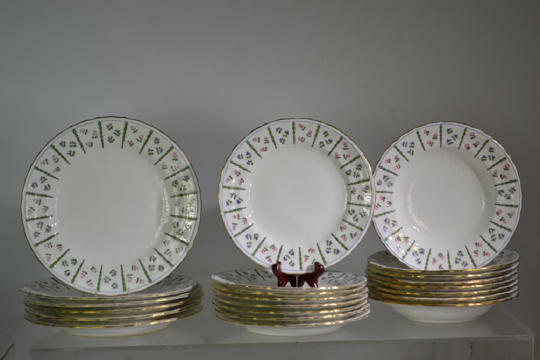 24 Piece Minton Partial China Service: Includes six 10" dinner plates, eight 8 1/2" luncheon plates and eight soup plates. All have good flashing and painted decoration. All marked Minton. Some marked W.H. Plummer New York. Set is circa 19