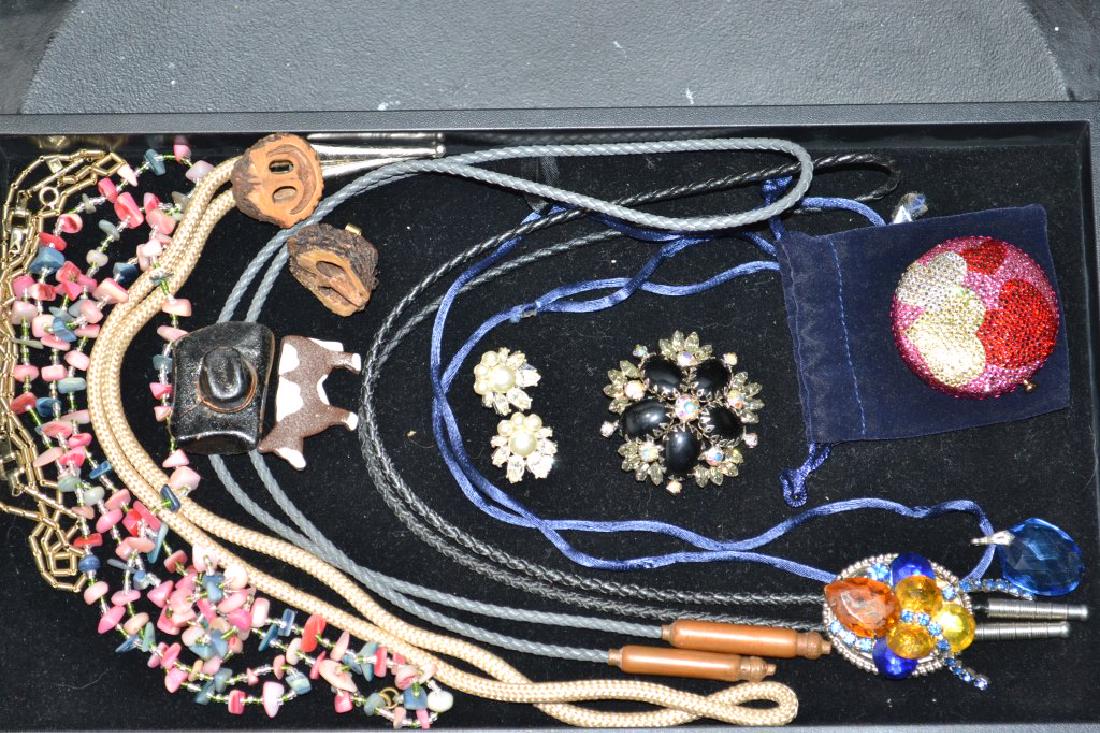 Mixed Costume Jewelry: Including Estee Lauder art, Swarovski stone compact, vintage bolos, rhinestones and more.