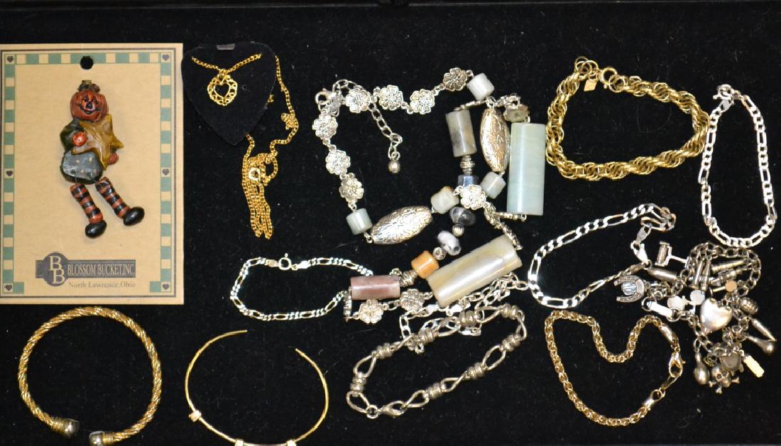 Sterling Bracelets and More: Including various sterling chain bracelets, a charm bracelet with military and other items, a necklace with minerals and more.