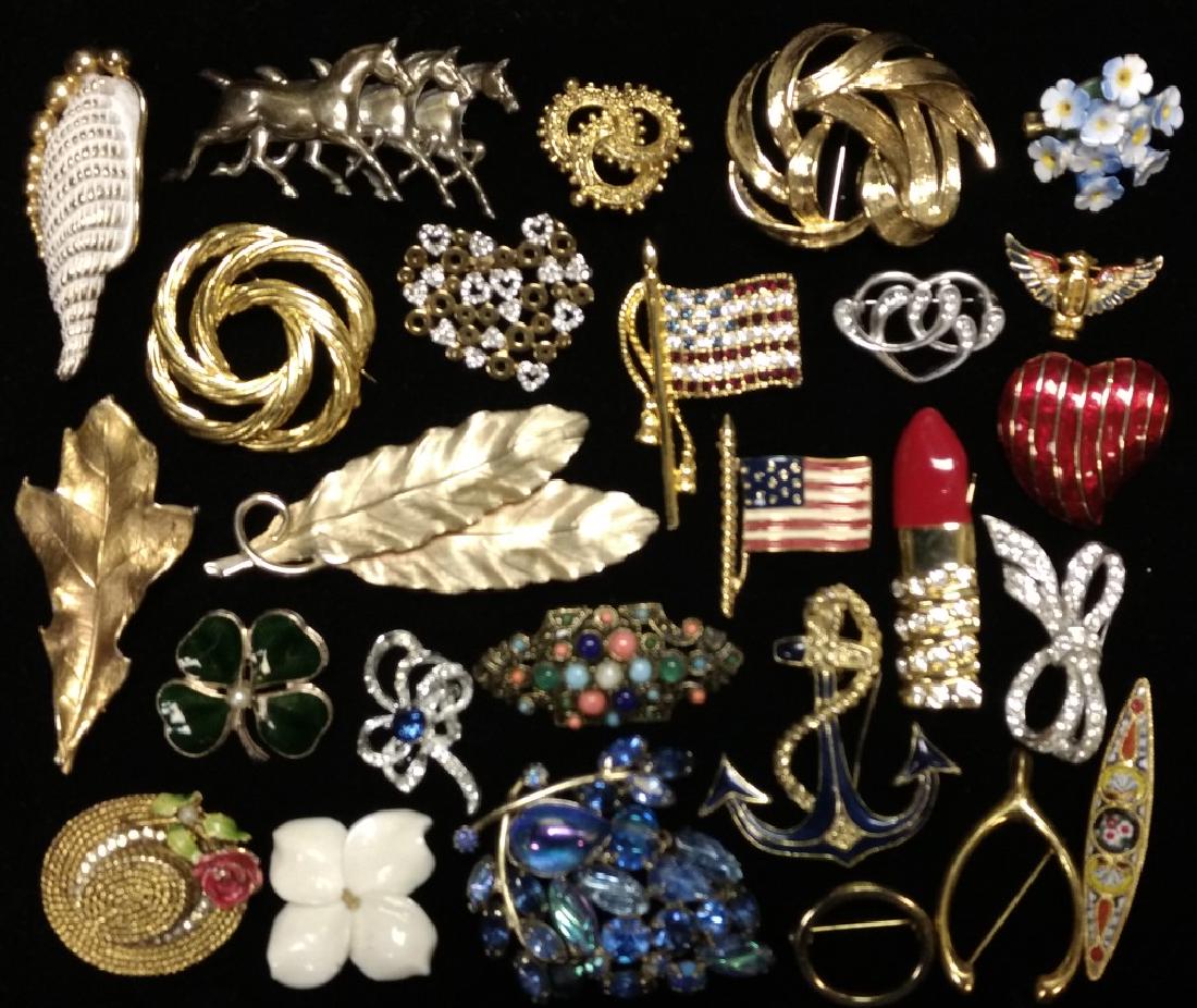 Vintage Pin Grouping: Including a sterling horse pin, a Coro eagle pin, a Trifari flag, a blue Weiss pin and more.