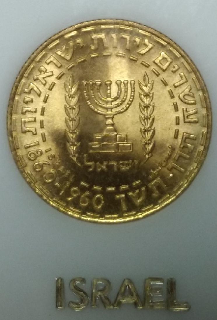 1960 Theodore Herzl Twenty Lirot Coin: It has a menorah pictured on it and is marked " Israel 1860 - 1960". It is encased in a permanent cover. Its weight is .2355oz gold.