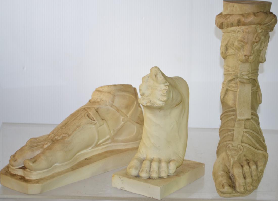 Sculptures of Roman Feet: The largest measures approx. 14"h. The second is marked "O. Brucciani & Co. London" and depicts a sandaled foot. Three total pieces. Items need to be cleaned.