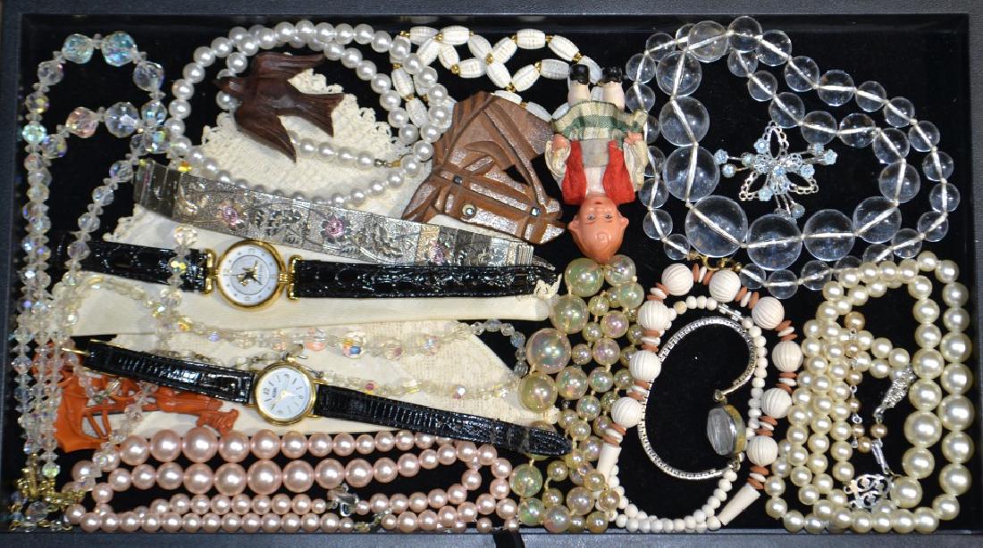 Necklaces and Watches: Including a Gruen, a ladies 17 jewel Swiss wrist watch, a Mary Kay wrist watch, faux pearls and more.