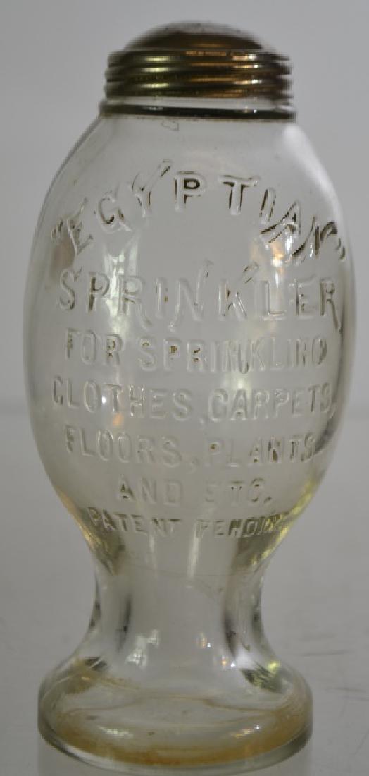 "Egyptian" Company Clothing Sprinkler (1 of 2)