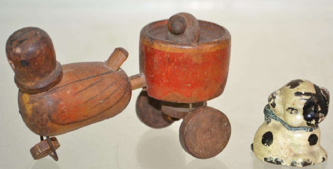 19th Century Wooden Mechanical Toy and More: Toy measures approx. 3"h x 4" in length. It depicts a bird pulling a nest containing a baby bird. The baby bird rotates as you pull the toy. The mother bird is missing its beak. Also includes a miniat