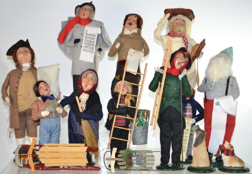 "Byers Choice" Doll Collection: Including Christmas carolers, a Santa, a baker, Ben Franklin and more. Ten dolls and accessories.