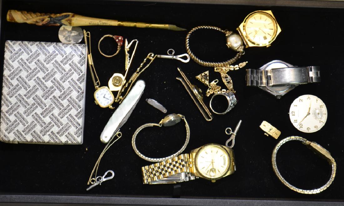 Men's and Lady's Watches and More: Including a Jules Jurgensen gold filled 1950's seventeen jewel watch, a Luger stainless steel watch, a Hamilton golden numeral movement, a Ronson lighter in the case and more.