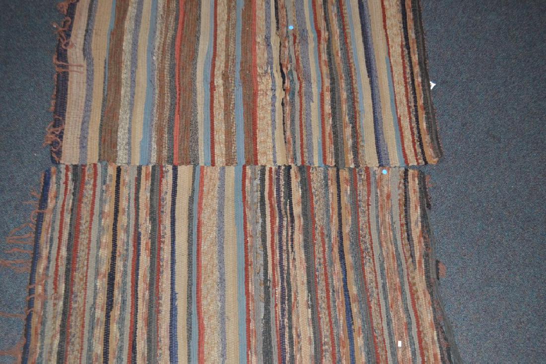 Two Rag Runners: The larger measures approx. 58" long x 35"w. Both date to the early 20th century. The larger has loss to one end where the threads have given way and the smaller is a remnant which may be used for rep