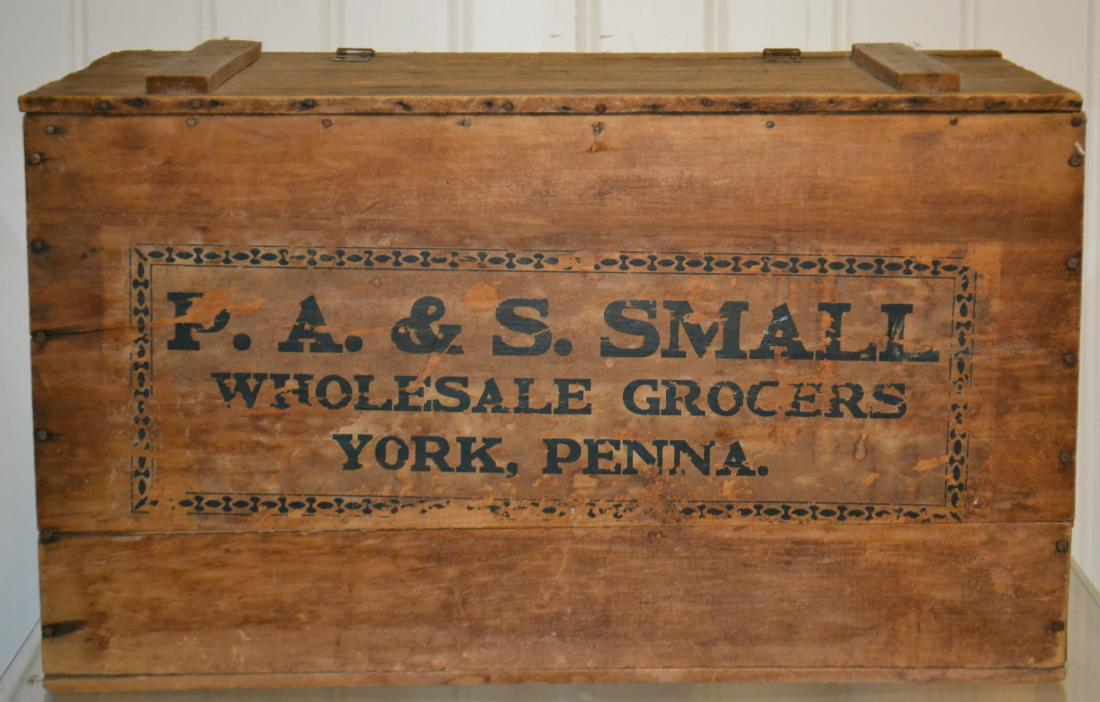PA & S Small Shipping Crate: Item measures approx. 14"h x 24"w x 14"d. The label reads "PA & S Small Wholesale Grocers York, Penna". Item has the original lid and hinges. The lid has been written on in pencil and crayon.