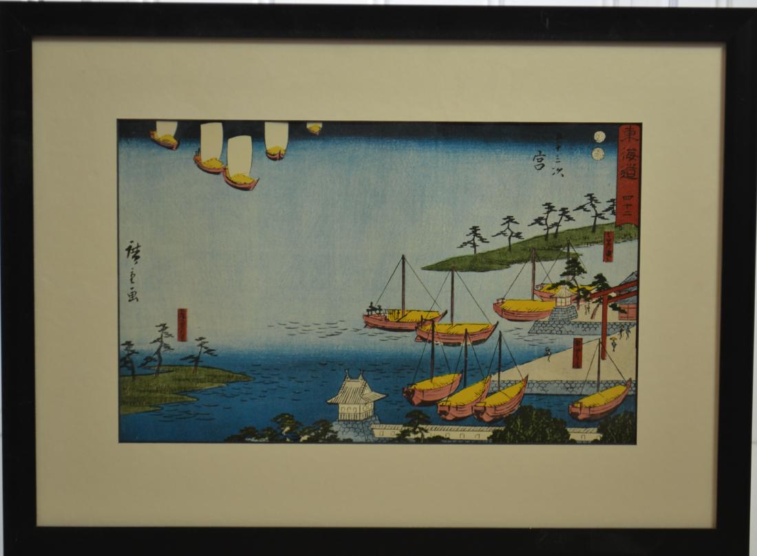 A Reisho Print by Ando Hiroshige: Exposed area measures approx. 9"h x 14"w. It depicts boats by a dock. It has a linear signature and is professionally framed.