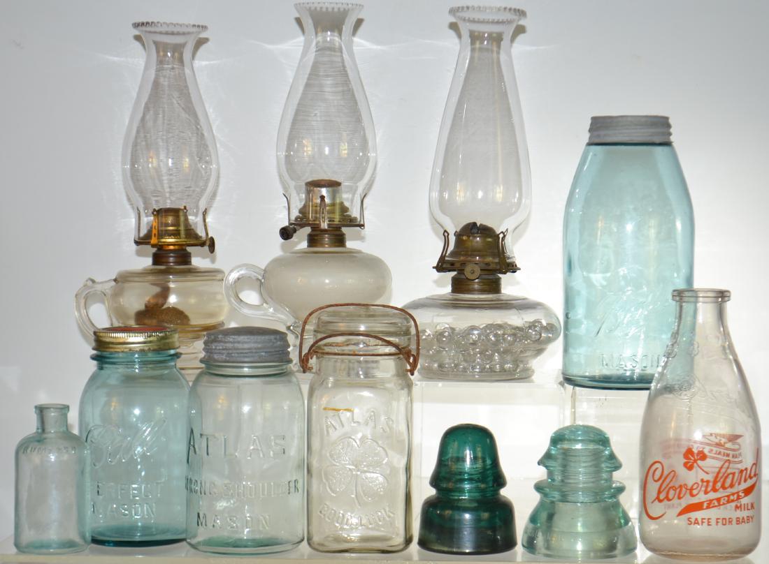 19th Century Oil Lamps and More: Includes three lamps ( two of which are finger lamps), blue Mason jars and more.
