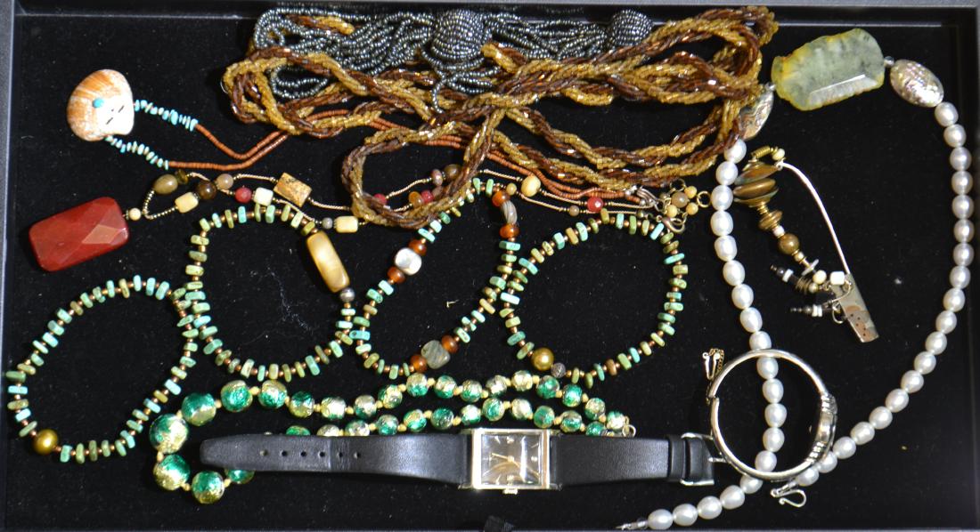 Turquoise Jewelry and More: Including four turquoise bracelets, a large glass beaded necklace, a lady's Bulova wristwatch, a lady's Wittnauer wristwatch and more.