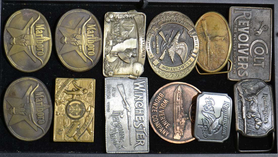 Sporting Belt Buckles and More: Including a "Remington" buckle, a "Winchester" buckle, a "NRA" buckle and more.