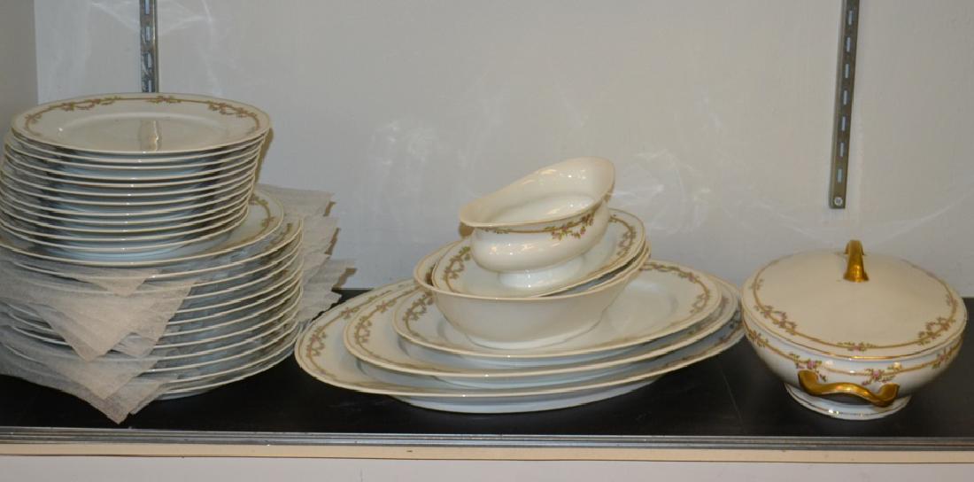 "Victoria Austria" Dinner Service: Includes three platters the largest measuring approx. 16" across. Also twelve 10" dia dinner plates, salad plates, covered vegetable dishes, cups and saucers and more.