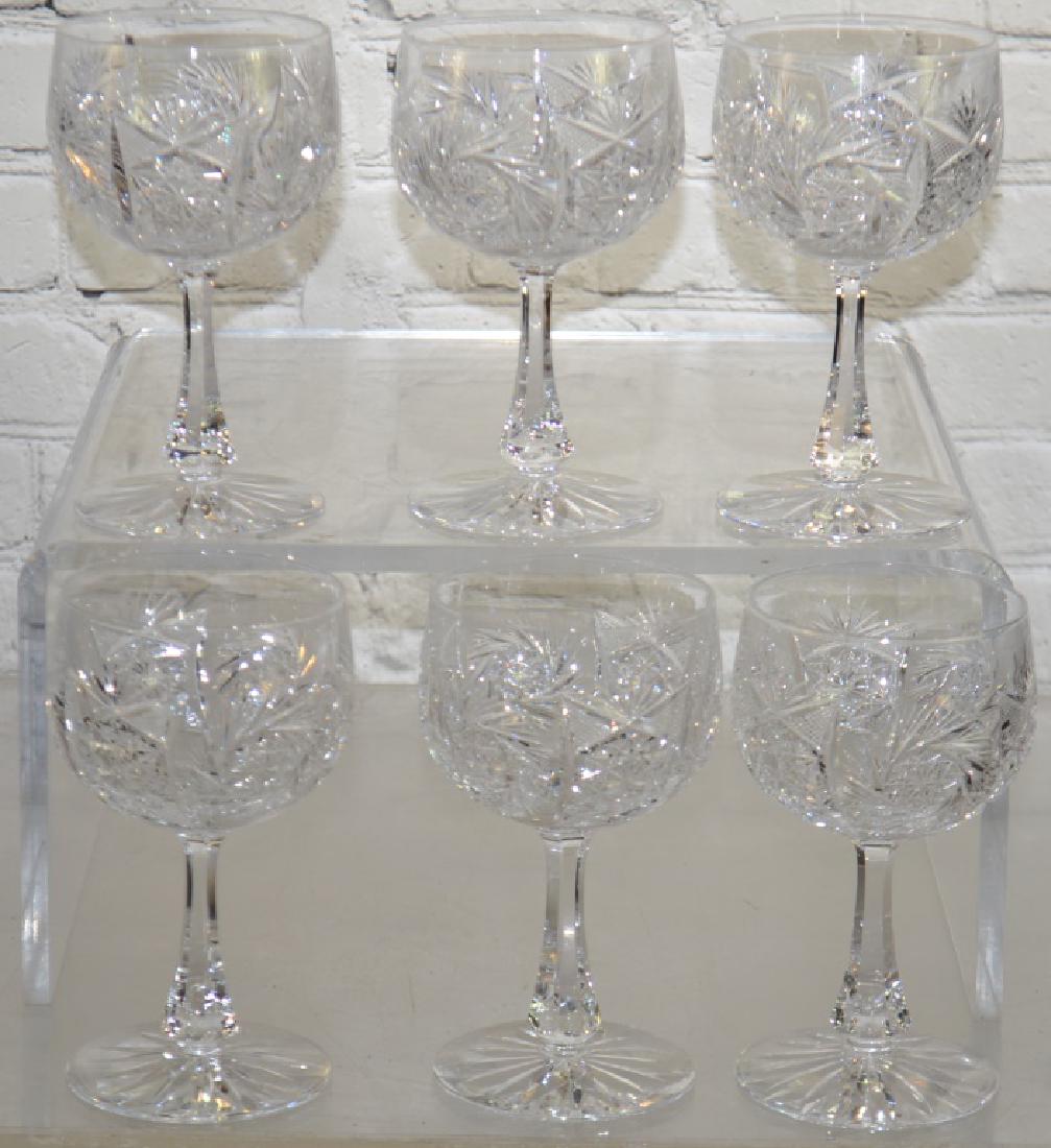 Set of Six Fine Crystal Wine Goblets: Each glass measures approx. 6"h. They have a machine cut pattern and no visible flaws.