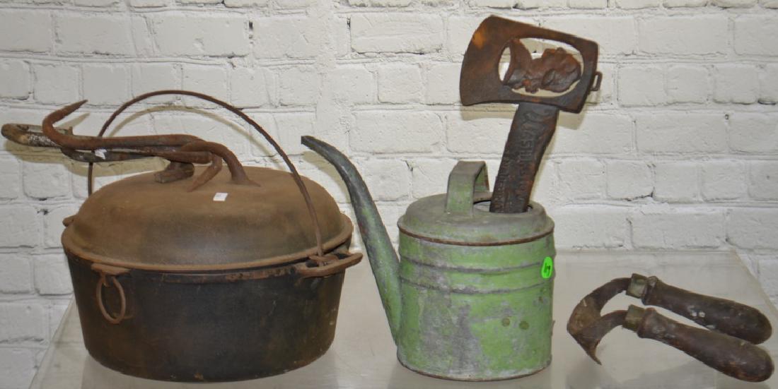 Vintage "Favorite" Dutch Oven and More: Lot includes a Dutch oven with lid, three kettle hooks, a watering can with green paint and more.