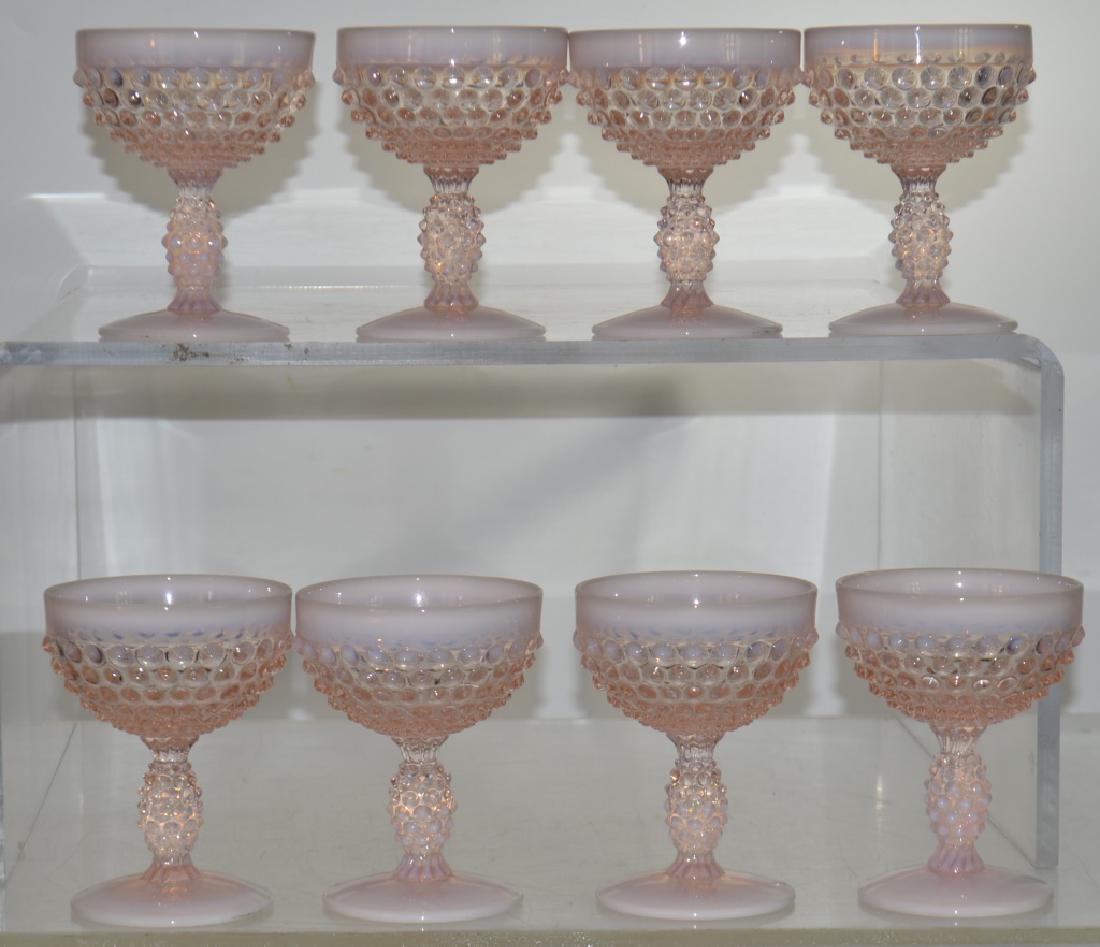 Set of Eight Fenton Hobnail Desserts: Each measures approx. 4 1/2" h. They are pink opalescent hobnail and have no visible flaws.
