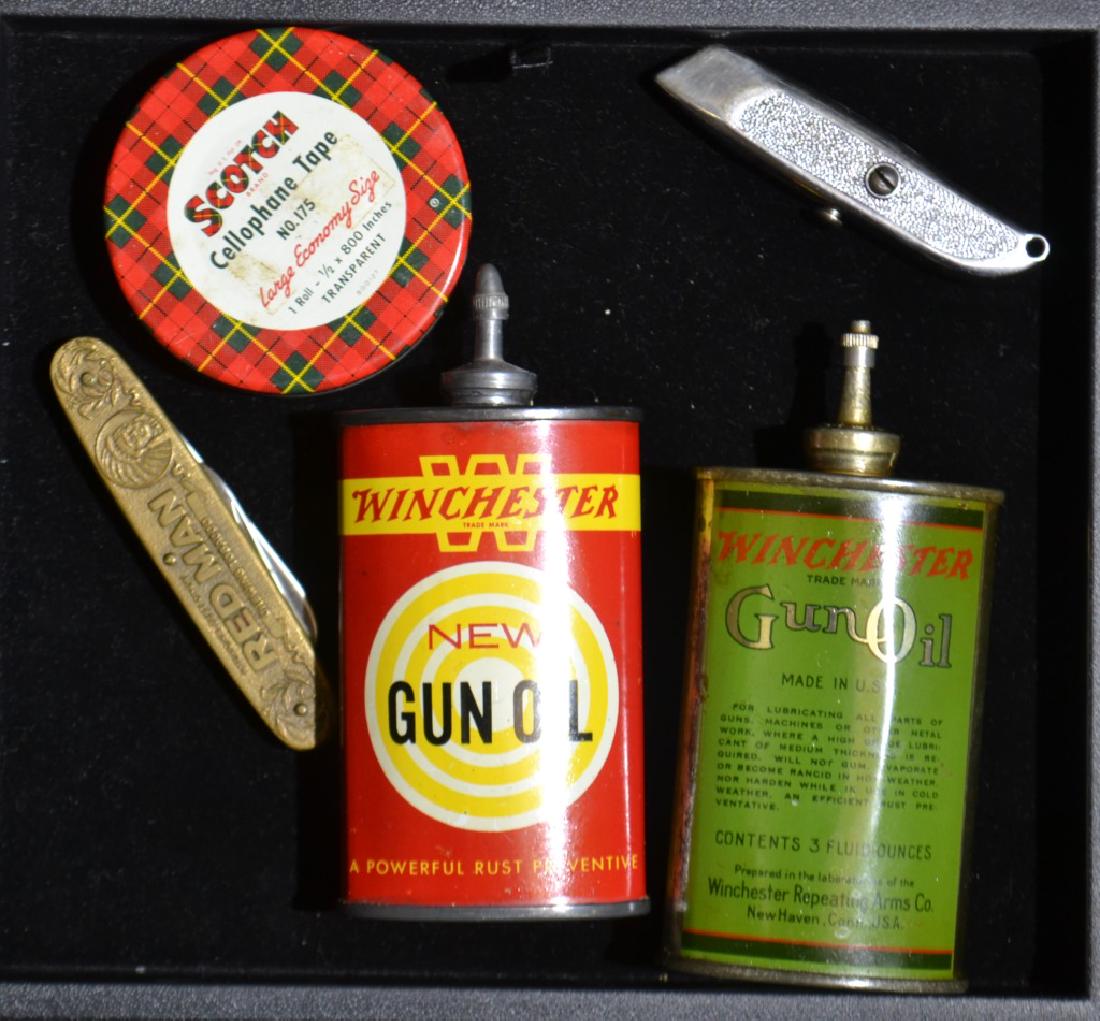 Winchester Gun Oil Tins: Including a green Winchester gun oil tin with a metal cap, a red Winchester gun oil tin with a metal cap and a "Scotch Cellophane Tape" tin.