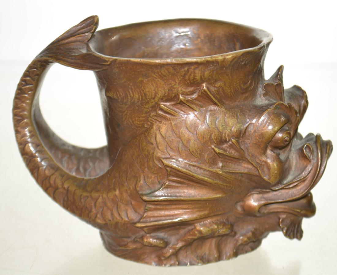 Bronze Sea-Creature Vessel signed by Julien Causse: Heavy bronze and great detail of serpents face, mouth and twin tales on the back form the handle. Signed on base of twin tales under handle "J. Causse"