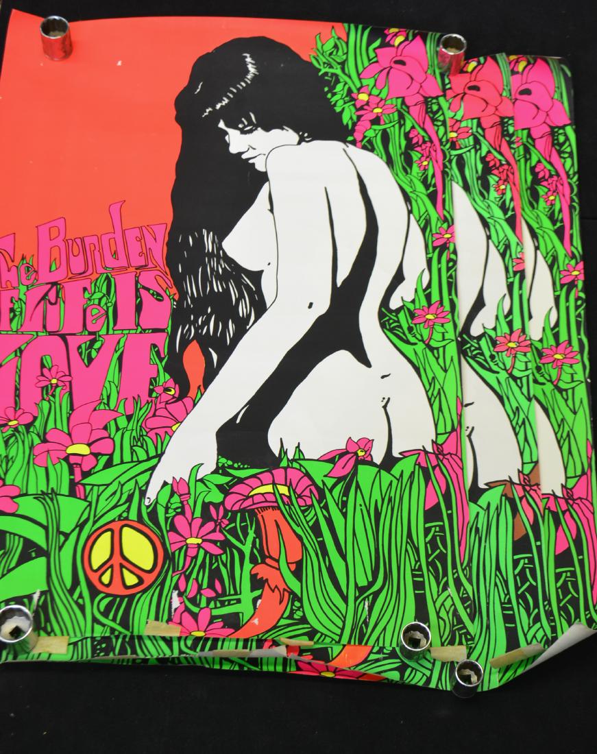 Three 1969 Black Light Posters: Each measures approx. 35"h x 24"w. They depict a nude girl in a flower garden. They read "The Burden of Life is Love" and were produced by "Poster Prints" in 1969. Posters show common wear consist wit