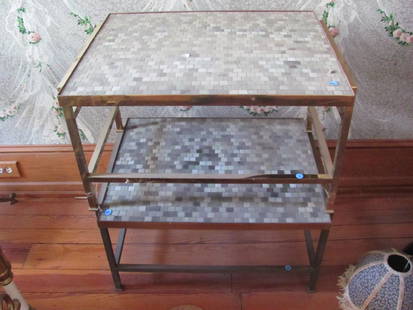 Pair of Dunbar Tile tables c. 1950: Pair Dunbar Brass & Murano Tile Top Occasional Table. Measures - 16 1/4" High, 26 1/4" wide, 20 1/4" length. label on the underside of the table. (Stacked in picture)