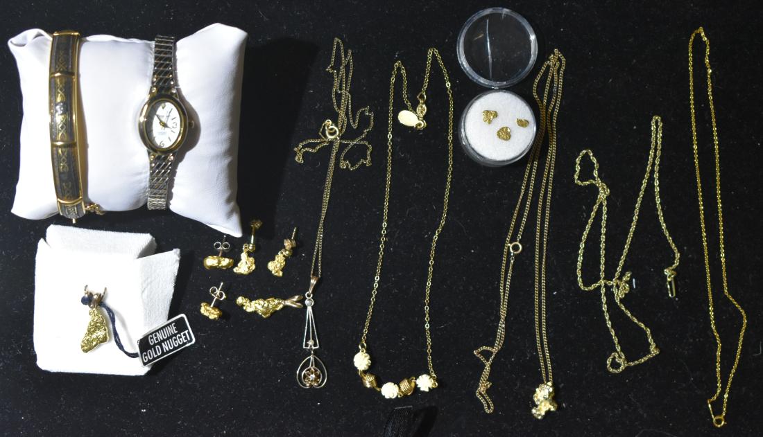 Gold Nuggat Jewelry and Chains: Includes a delicate 10K gold chain, atwo gold nuggat pendants, gold nuggat earrings, a lady's Gruen watch and a Damascene bracelet.