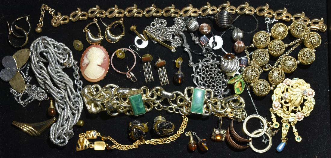 Mixed Costume Jewelry: Including an Art Nouveau pin marked "JJ", a cameo pendant, a gold tone necklace with orbs and other necklaces and earrings.