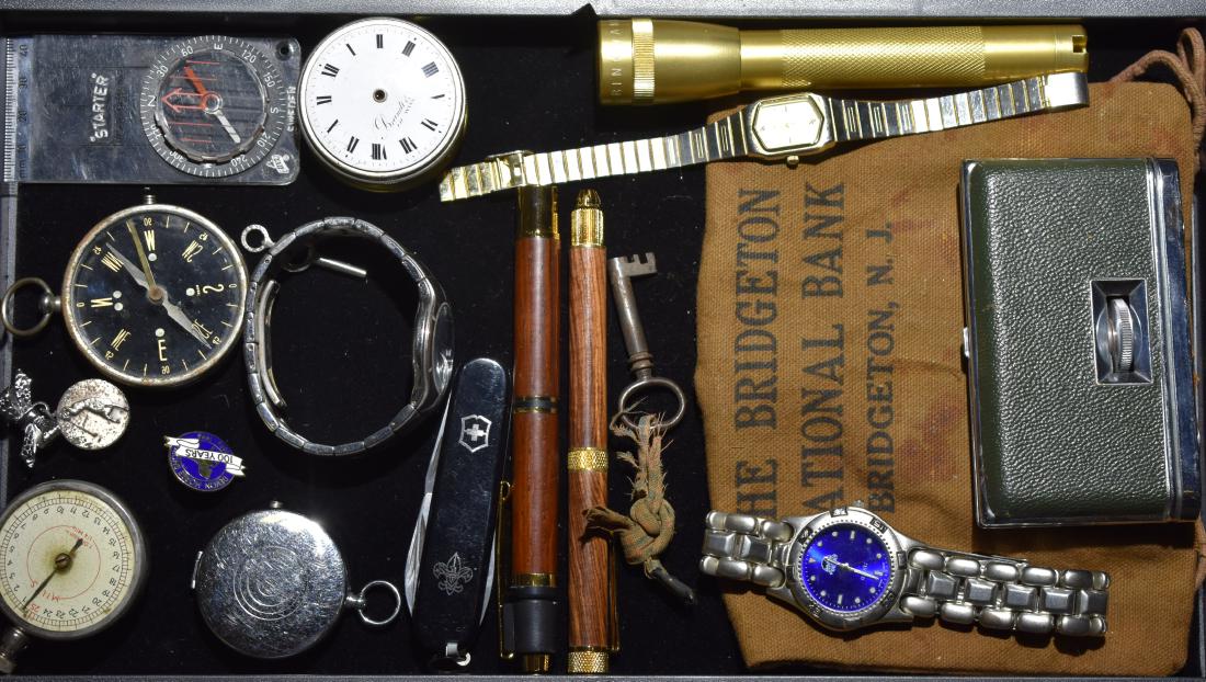 Watches, Compass, Flashlight and Pocketknife Group: Watches, Compass, a Flashlight and Pocketknife Group, a Bulova Stainless water-resistant Men's watch, watch parts, a pocket watch and a key