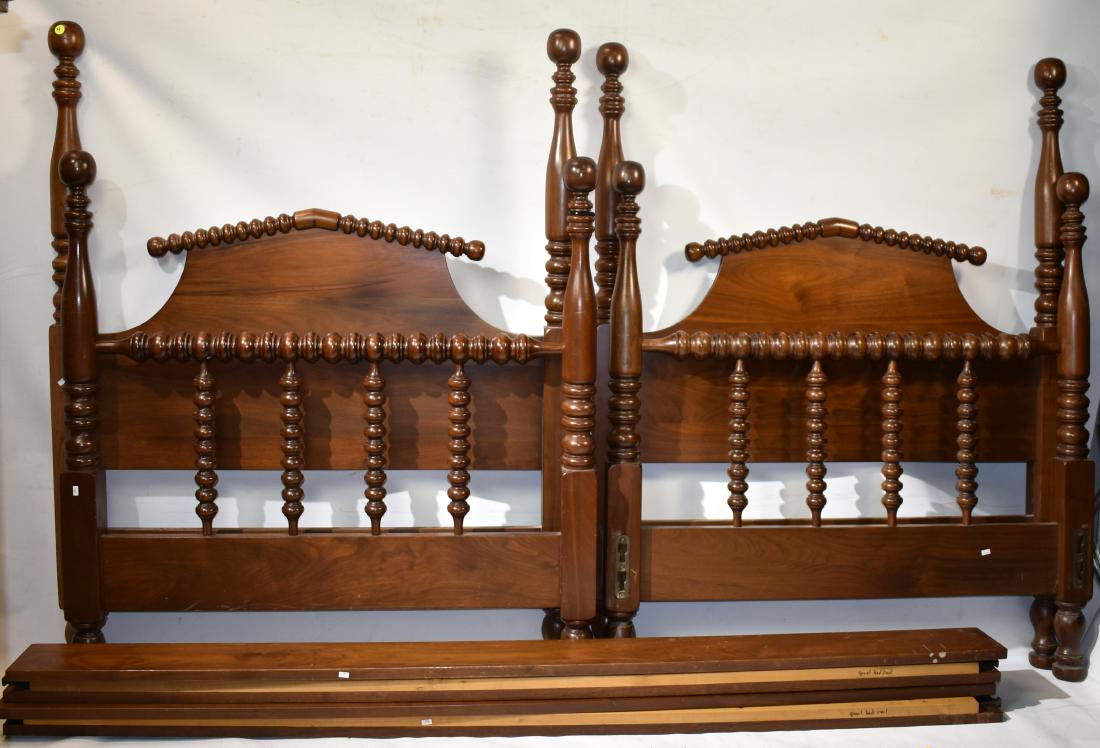 Pair of Walnut Jenny Lind Beds: Beds measure approx. 51"h x 41"w each. They are solid walnut construction and both are complete with the rails.