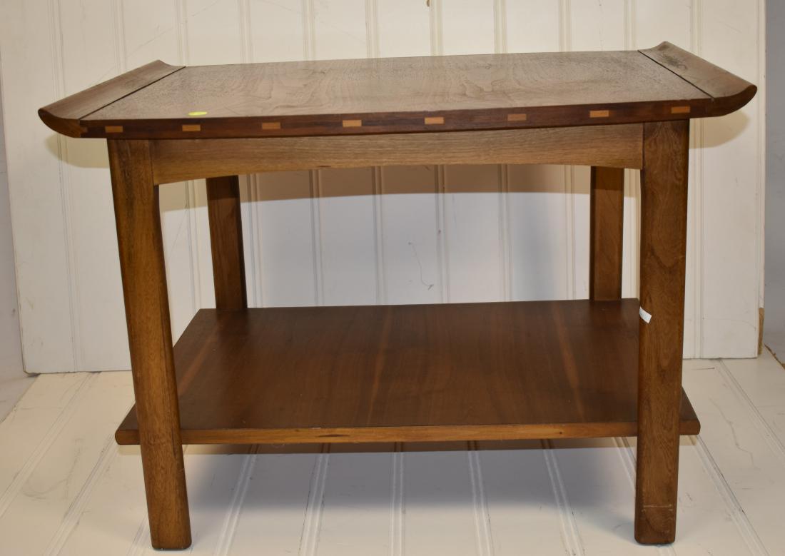 "Lane" Post Modern Coffee Table: Item measures approx. 20 1/2"h x 29"w x 20"d. It is a walnut table with mortised accents.