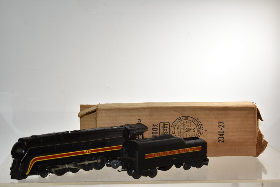Lionel #746 Norfolk & Western Train & Tender: Item is a Streamline Engine with the tender. Both items appear to be complete and the engine has a box the reads "St. Joe Craft #2340-25" No