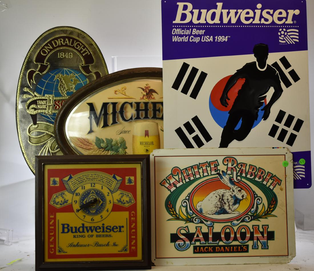 Beer Advertising Grouping: Including a Budweiser advertising clock, a Michelob advertising sign, a Schlitz advertising mirror dated 1976 and other related advertising items.