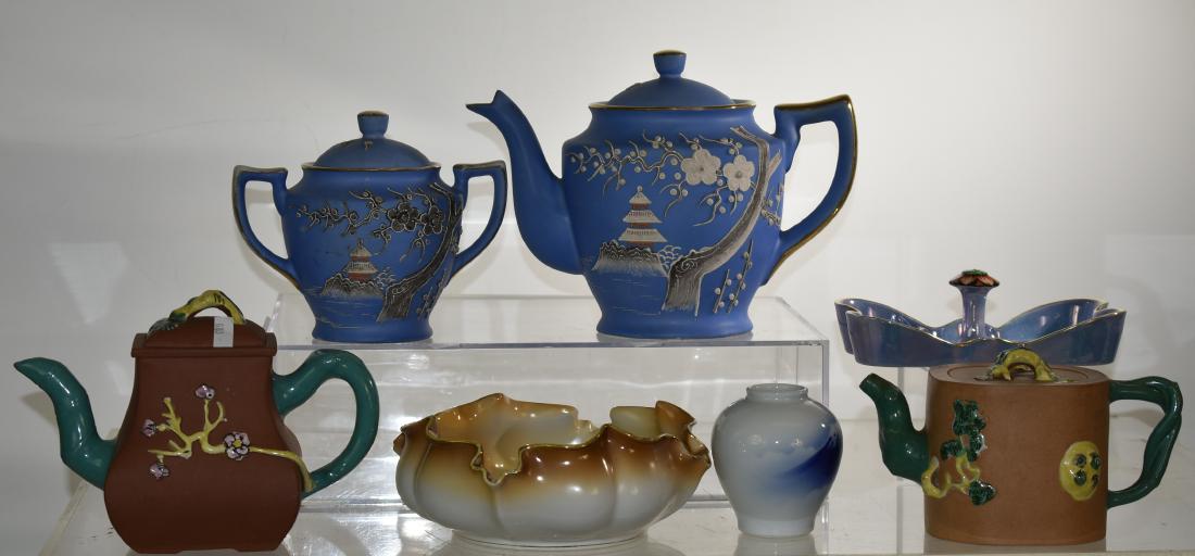 Asian Ceramic Grouping: Including two Chinese teapots - one with a chop mark, a Japanese teapot with a matching sugar, a hand painted Nippon nut bowl and other Asian items.