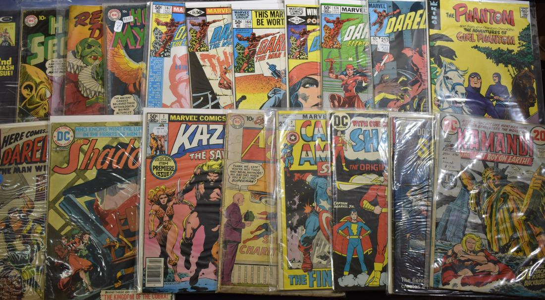 Twenty Super Hero Comics: Including "The Shadow" 20 cents, a selection of Daredevil" comics - most are 60 cents, "House of Secrets" 10 cents, Action comics with Superman 10 cents and others.