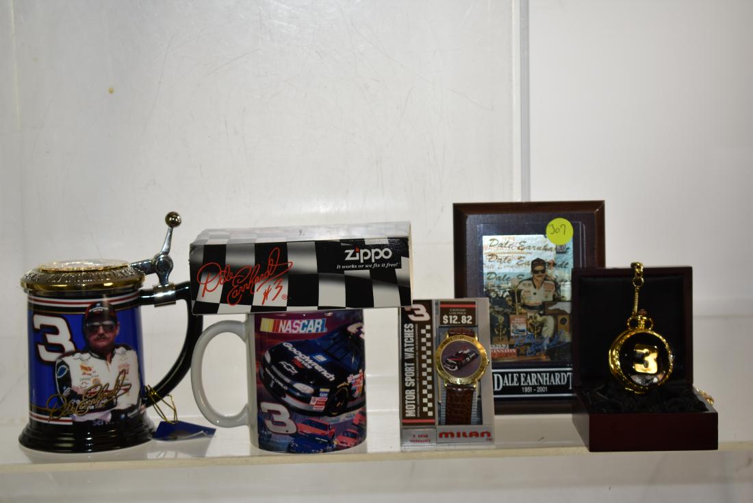 Dale Earnhardt Collection: Including a Wrist watch, pocket watch in wooden case, a beer stein and coffee mug, a deck of playing cards and a framed trade card.