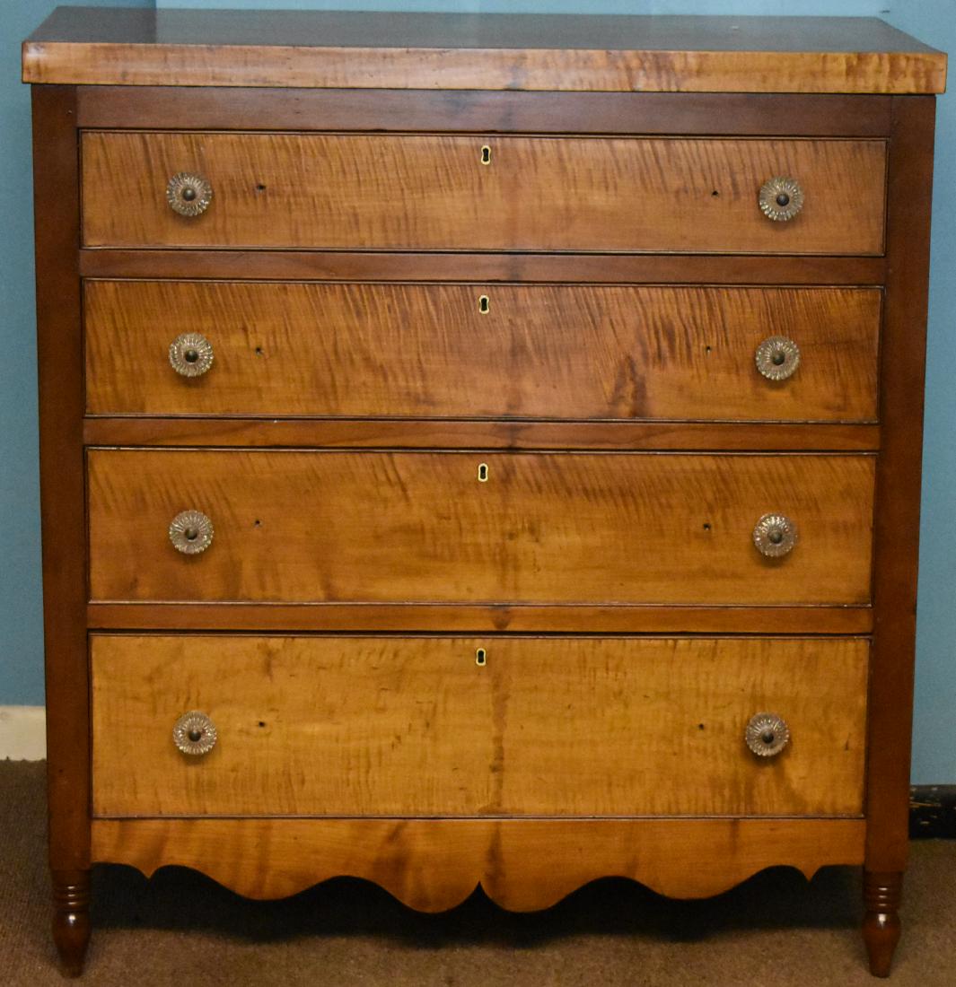 Early 19th Century Tiger Maple Chest of Drawers: Item measures approx. 41"h x 44"w x 20"d. It has a tiger maple front and drawer fronts, a cherry frame, replacd hardware, a well executed skirt and stands on a well turned leg.