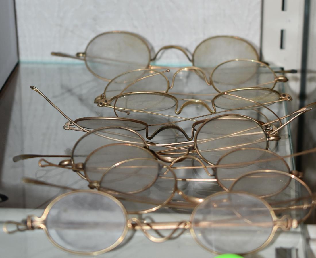 Eight Pair of 19th Century Eye Glasses: Several pair are marked "Stevens & Co.", one pair is marked "Hy-Grade", and one pair is marked "Greeme". Some may be gold filled.