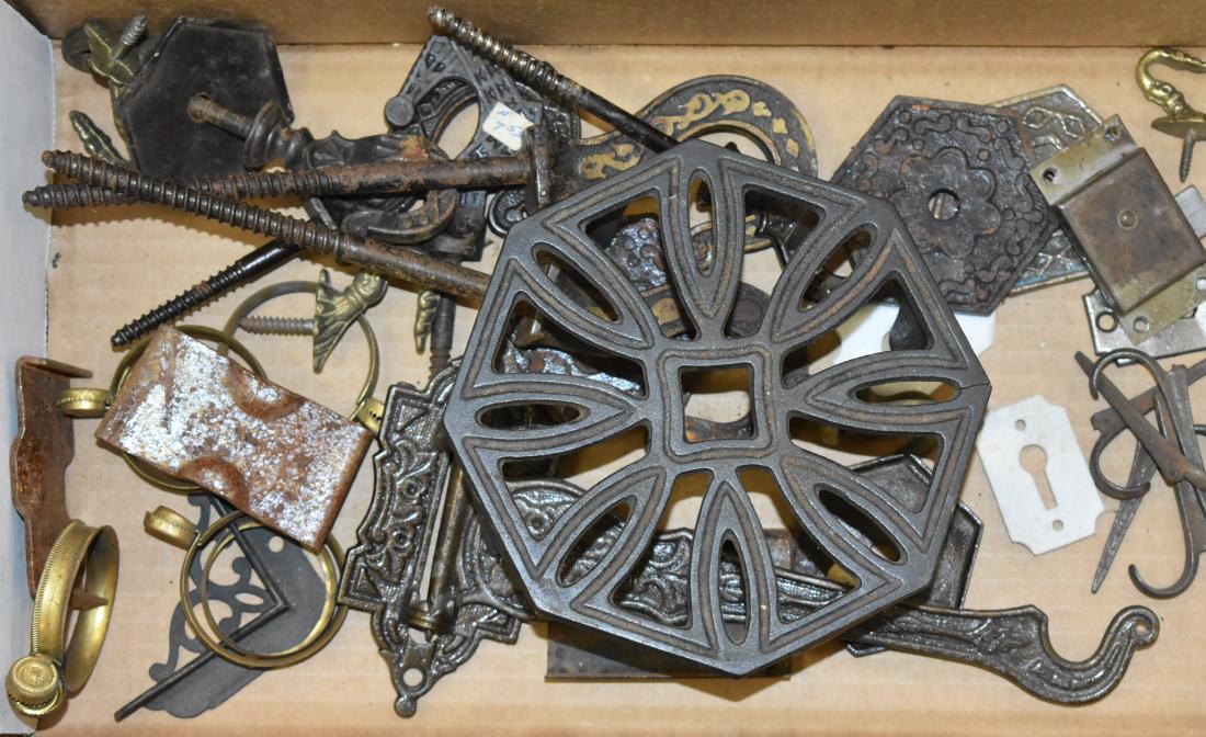 Victorian Hardware Group: Including six ornate Victorian hooks - most with back plates, a Victorian hanging bracket, two porcelain escutcheons and other related items.