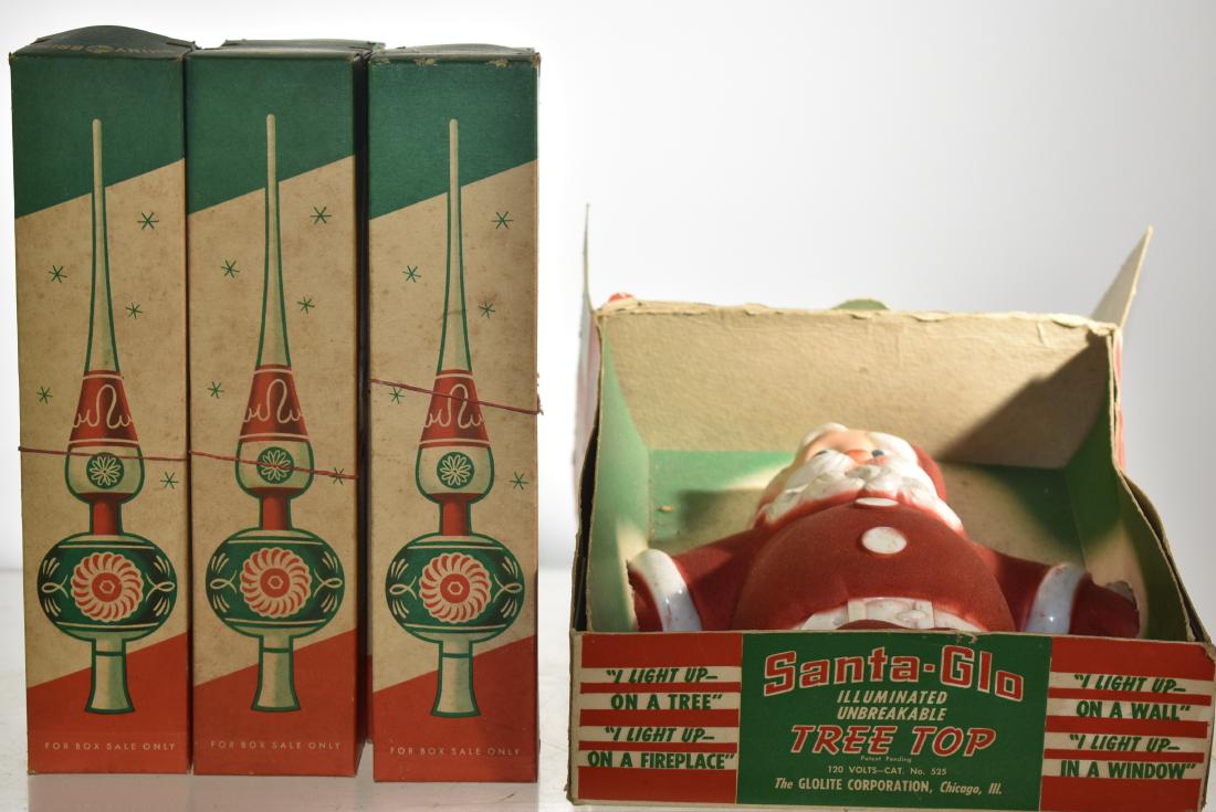 Vintage Christmas Grouping: Including a "Santa Glow" tree topper in box and eight "Shiney Brite" tree toppers - all in original boxes.