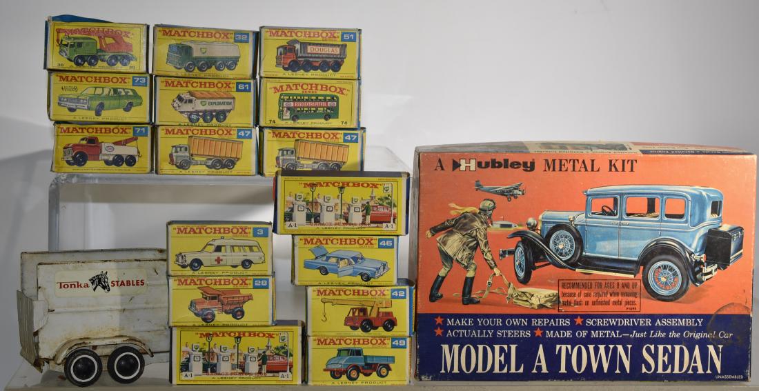 Lesney and Hubley Items: Including sixteen Lesney match box cars - all with original boxes and a Hubley metal A Town Sedan in box.