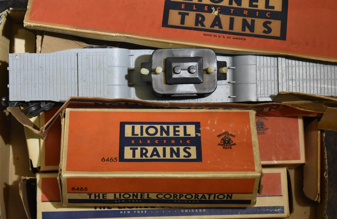 Vintage Lionel Train Cars with Boxes: Including a B & O automobile car #6468, a box car #6464-500, a search light extension car #3650, a transformer car #6518-10 (box is badly damaged) and tank car #6465.