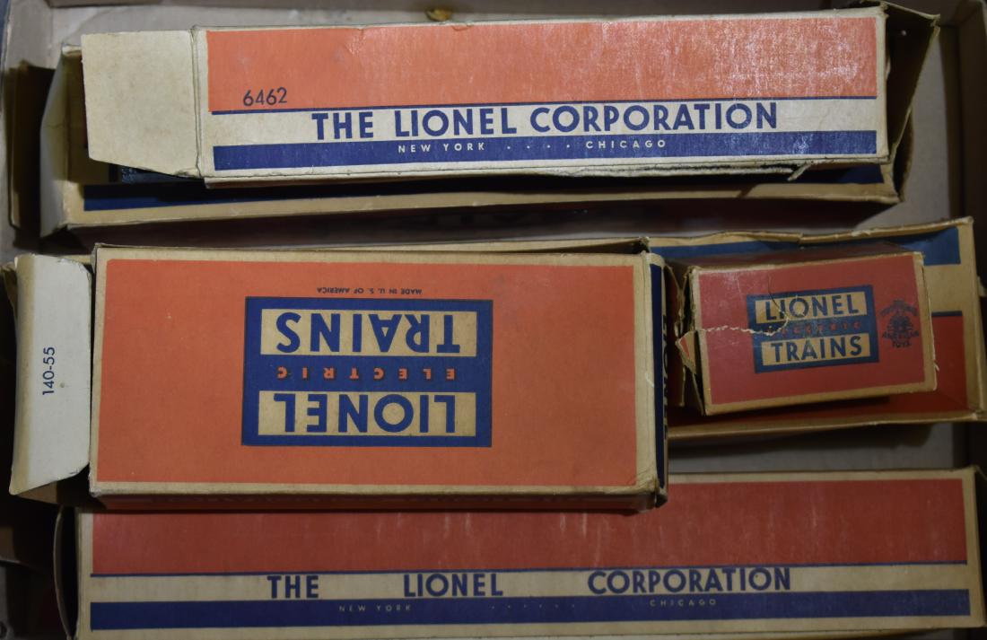 Vintage Lionel Train Cars in Boxes: Including an operating dump car #3359, an operating lumber car #3361 (no logs), an "Alcoa" car #6346, a gondola car #6462, a banjo signal #140 and illuminated bumper #260.