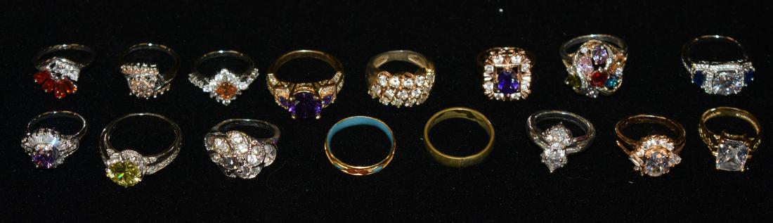 Grouping of Sixteen Rings: Including gold tone and silvertone rings with colored stones and rhinestones